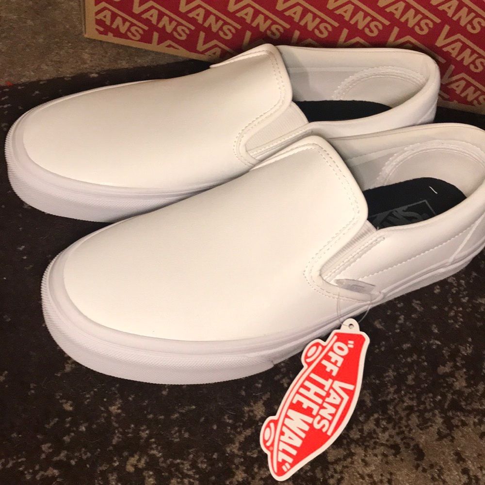 Vans classic white leather slip- ons